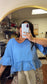 Skyliner Ruffle Top